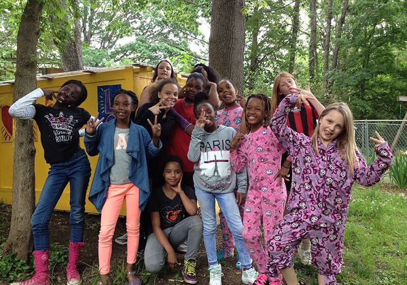 Girls posing for a group photo.